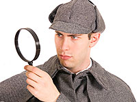 Detective with a magnifying glass