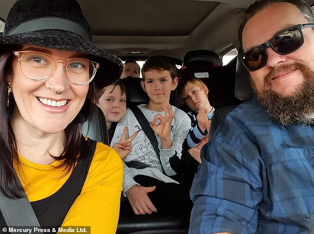 The 37-year-old polyamorous mother and her husband Robert with their four children