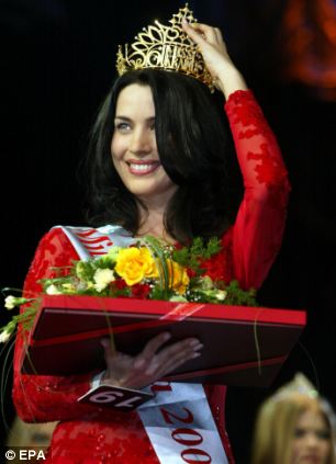 Stogniy Olena, 25, a student from Kiev, smiles after she was crowned Miss Ukraine in Kiev in 2002