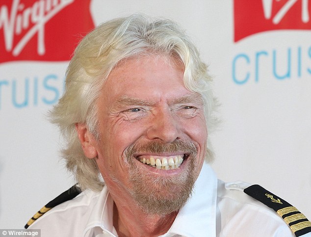 Richard Branson, pictured at a Virgin event, claims  happiness is the secret to his success in a new book for mental health charity Mind