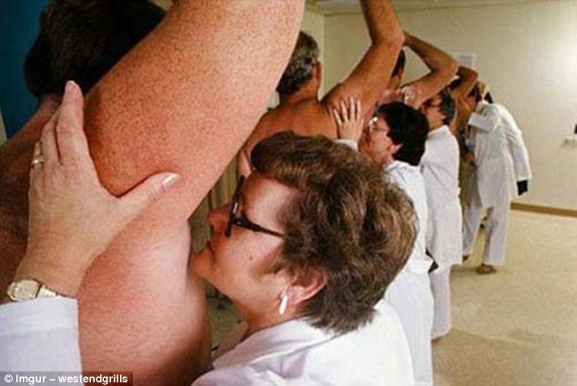 The workers in this photo are paid to sniff the armpits of volunteers as part of a quality control procedure for a deodorant brand