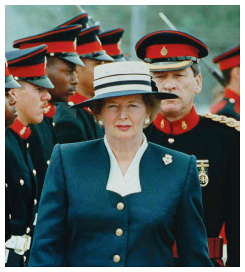 As the first woman to become prime minister of the United Kingdom, Margaret Thatcher was well aware of breaking new ground in her embodiment of a political leader. She favored a sober, no-nonsense style of dress and demeanor and cultivated a lower-pitched voice for public speaking. <strong>White House Photo Office/Wikimedia Commons</strong>