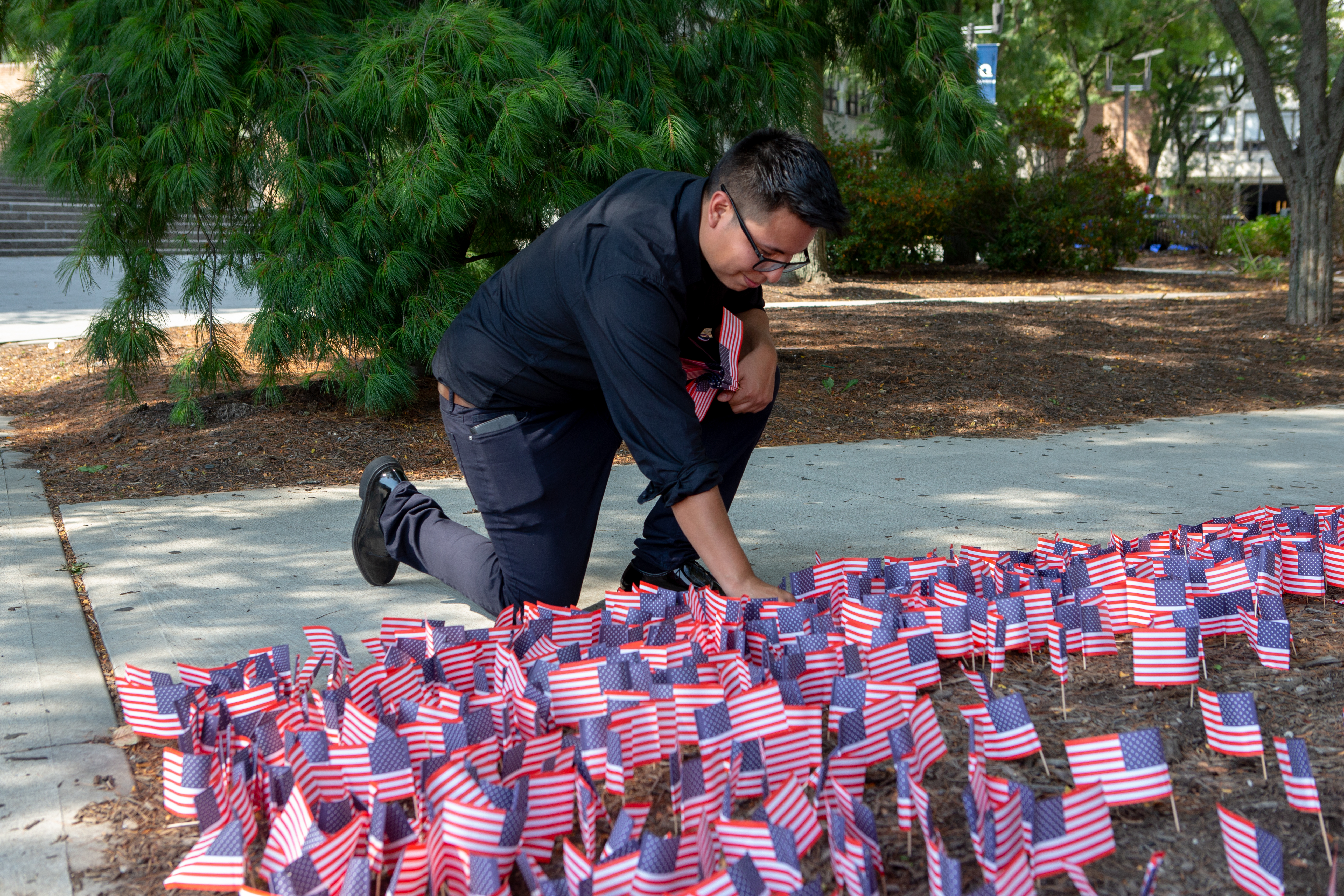 Tejeda tends to the Americal flags.