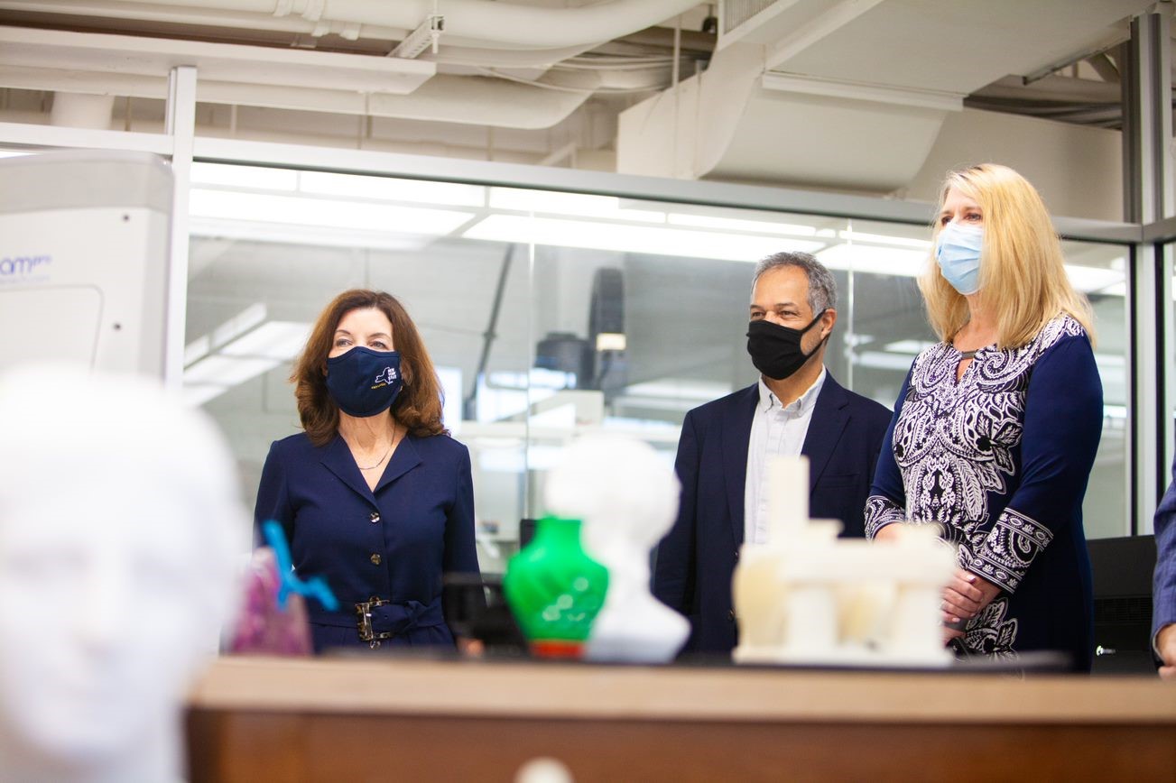 New York State Lieutenant Governor Kathy Hochul, left, tours Queensborough’s Advanced Manufacturing and 3-D Printing Lab with Professor Hamid Namdar, Chair and Professor of Engineering Technology, and Queensborough President Dr. Christine Mangino