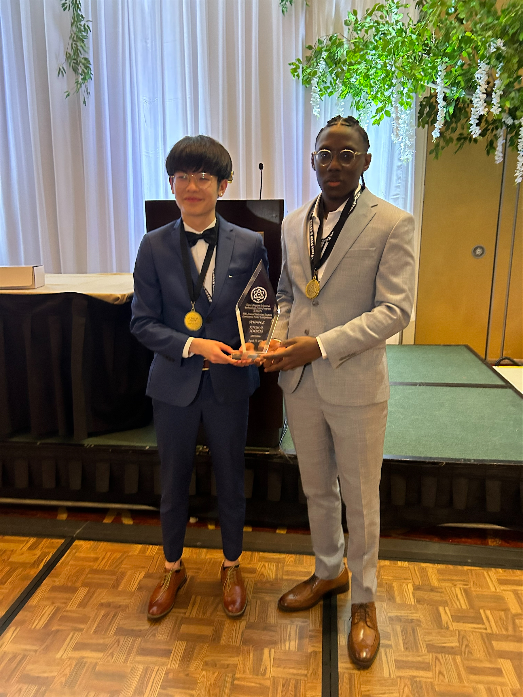 Queensborough students and 2023 CSTEP presenters Ho Martin Yueng (first place winner) and Elijah Bernard (92/100)