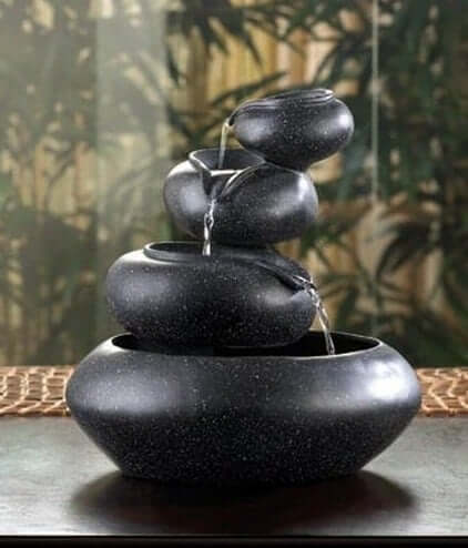 Incorporating a water feature will also help with the Feng Shui of the room